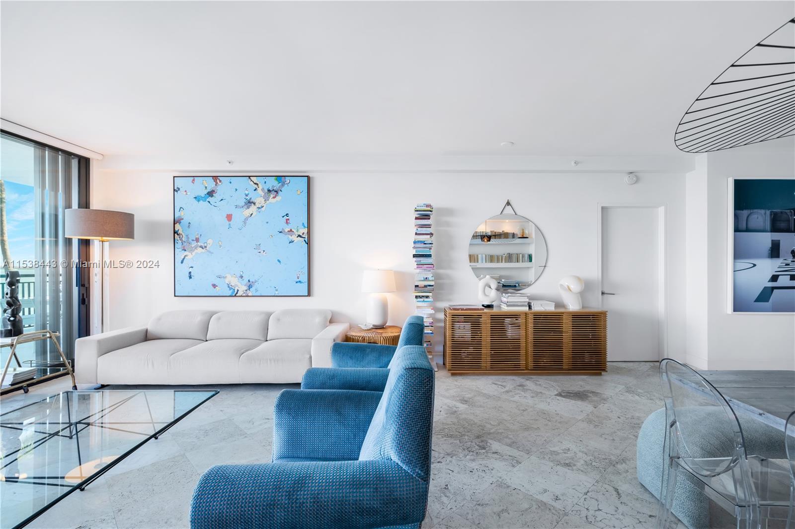 540 Brickell Key Drive, Unit 320 Miami, FL 33131 - Photo 7 of 32 a living room with furniture