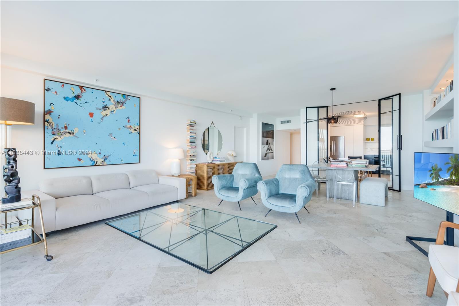 540 Brickell Key Drive, Unit 320 Miami, FL 33131 - Photo 8 of 32 a living room with furniture and a painting on the wall