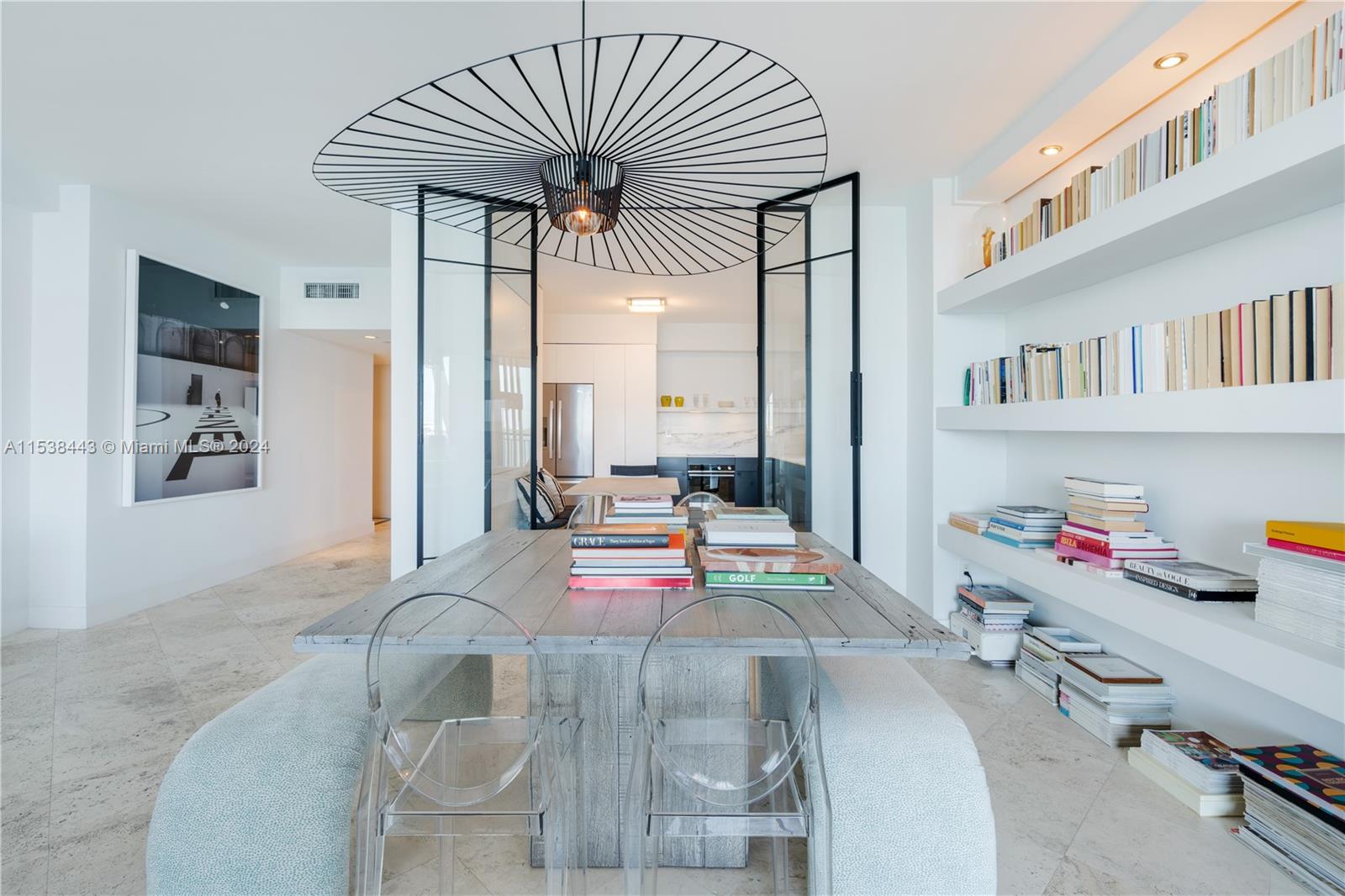 540 Brickell Key Drive, Unit 320 Miami, FL 33131 - Photo 9 of 32 a bedroom with furniture and a large window