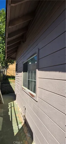 a view of a house with a large window