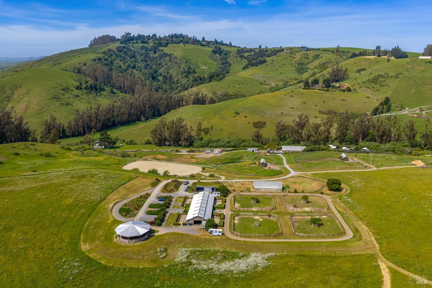 4707 Bloomfield Road Petaluma, CA 94952 - Photo 10 of 97 8 stall barn, large tack room, office, double wash racks with hot water, office, high speed internet, video monitoring, covered round pen, outdoor arena, hay barn, 4 large pastures