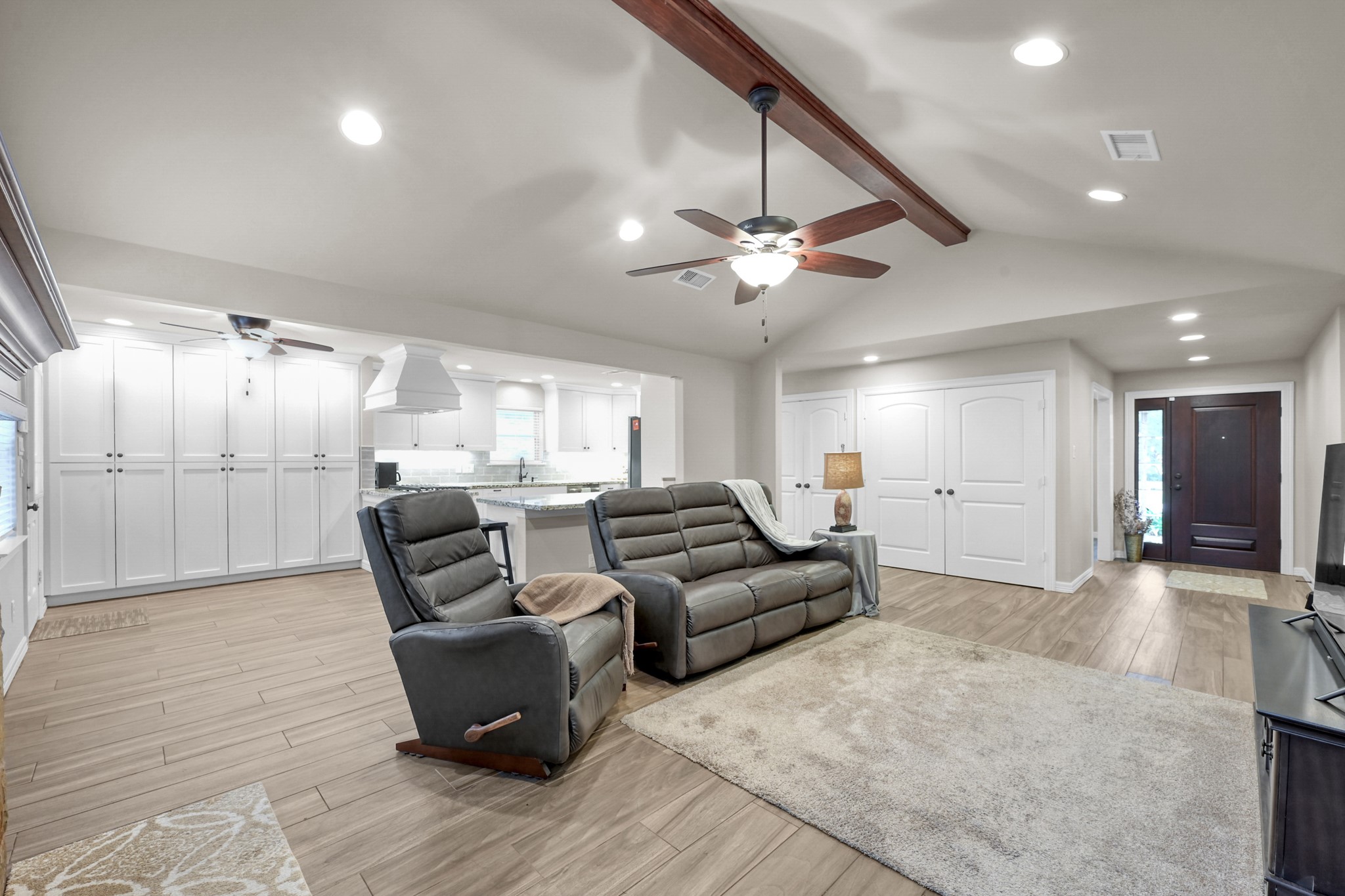 19003 Whitewood Drive Spring, TX 77373 - Photo 16 of 48 a living room with furniture and a chandelier