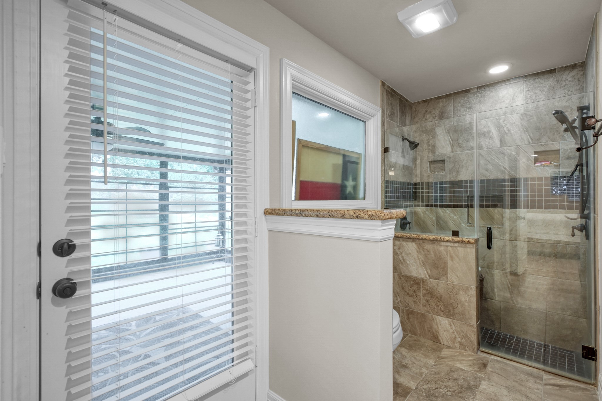 19003 Whitewood Drive Spring, TX 77373 - Photo 20 of 48 a bathroom with a shower and a sink
