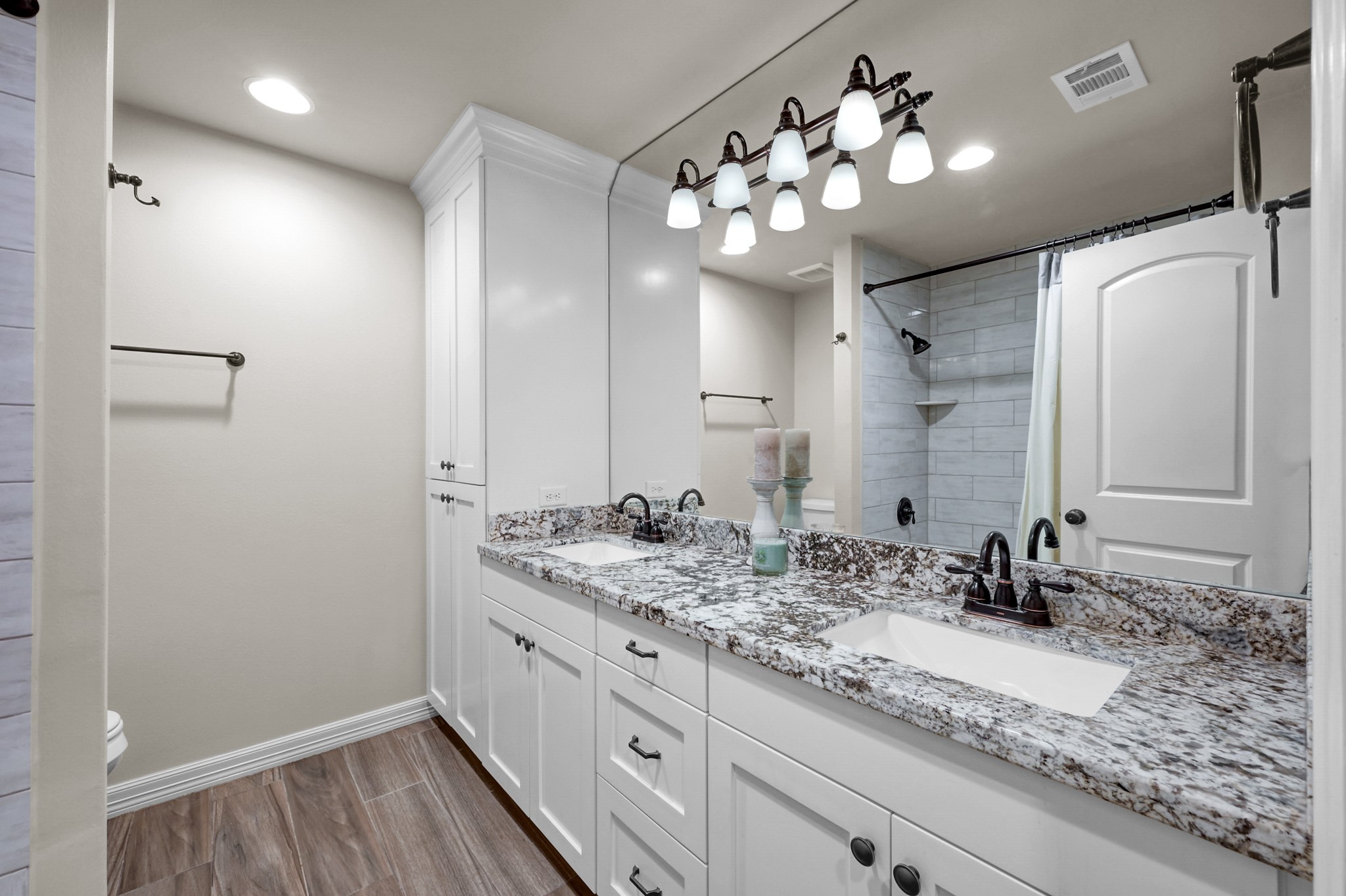 19003 Whitewood Drive Spring, TX 77373 - Photo 24 of 48 a bathroom with a sink double vanity granite and a mirror