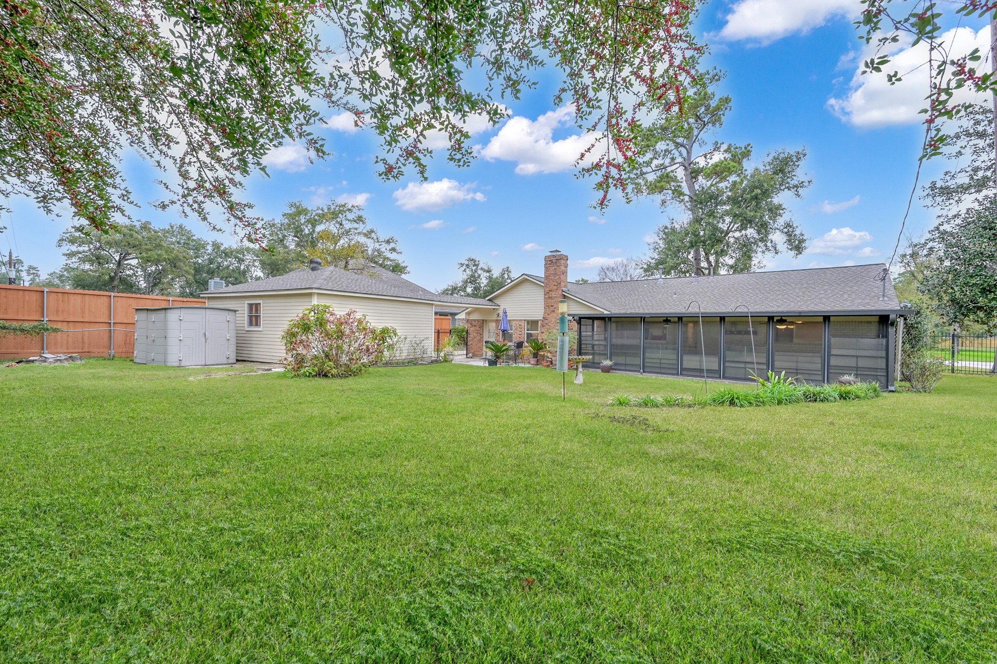 19003 Whitewood Drive Spring, TX 77373 - Photo 34 of 48 a view of an house with backyard space and a tree