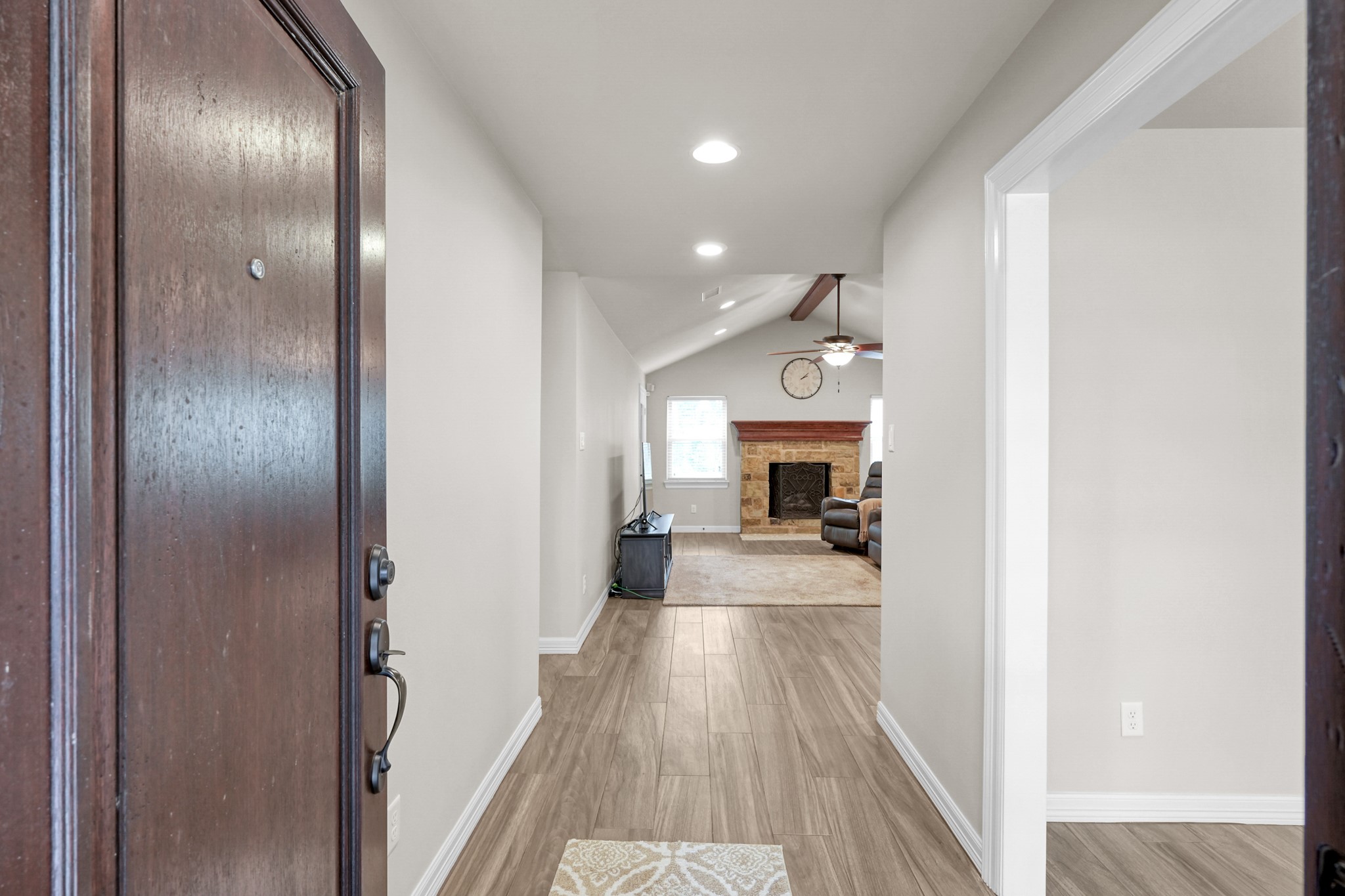 19003 Whitewood Drive Spring, TX 77373 - Photo 5 of 48 a view of a living room with a fireplace and wooden floor