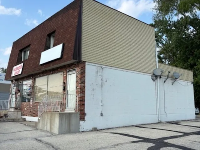 a view of a building with a street