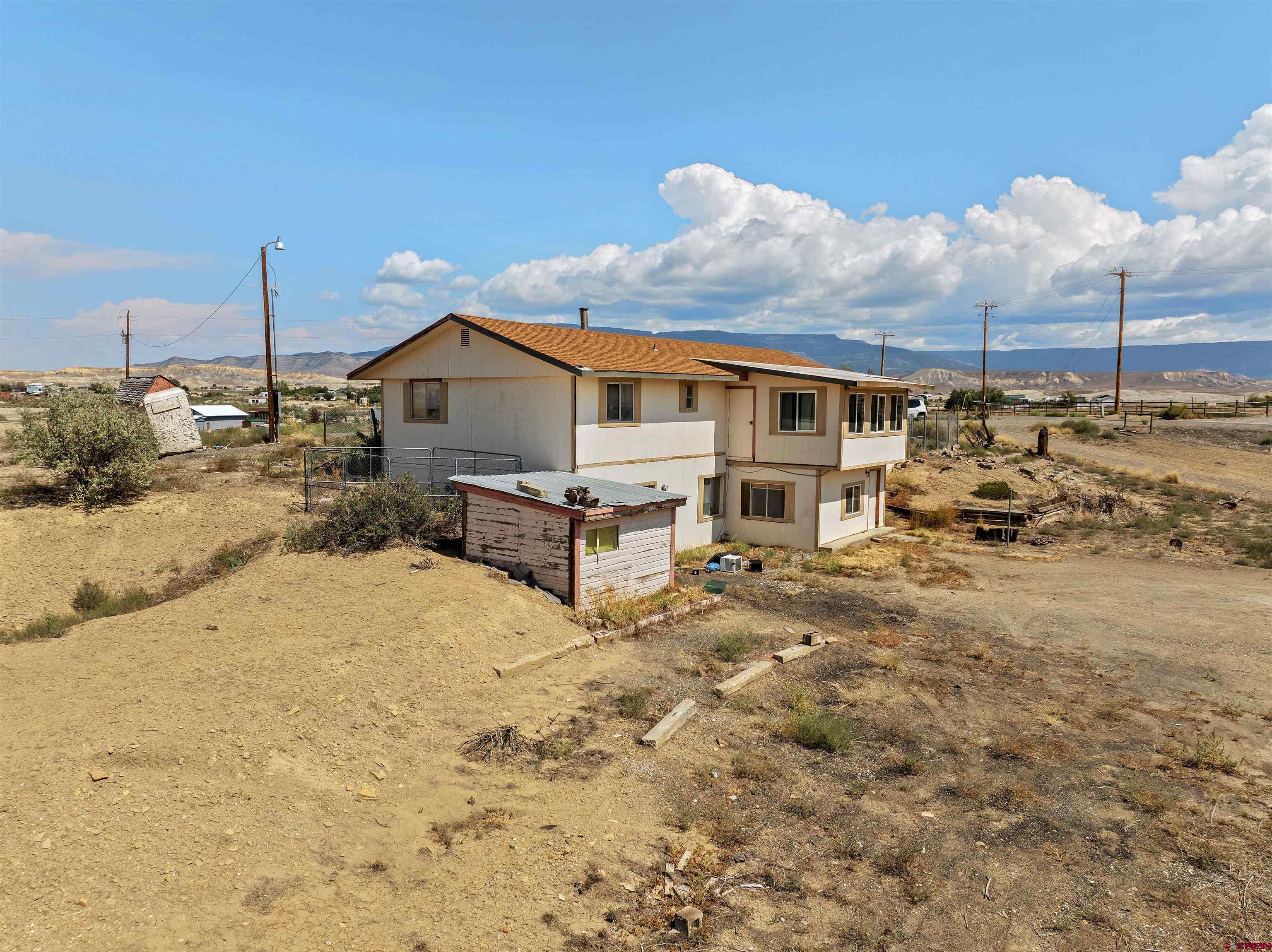 160 Reeder Mesa Road Whitewater, CO 81527 - Photo 16 of 22 a view of a house with a yard