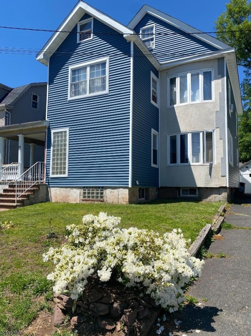 17 Walnut Terrace Bloomfield, NJ 07003 - Photo 18 of 18 a front view of a house with a yard