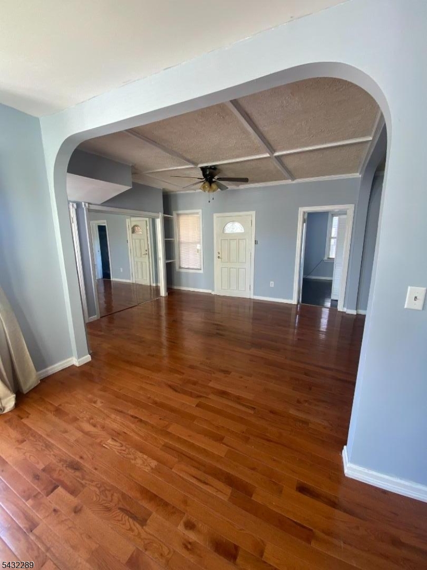 17 Walnut Terrace Bloomfield, NJ 07003 - Photo 4 of 18 a view of livingroom with hardwood floor and front door