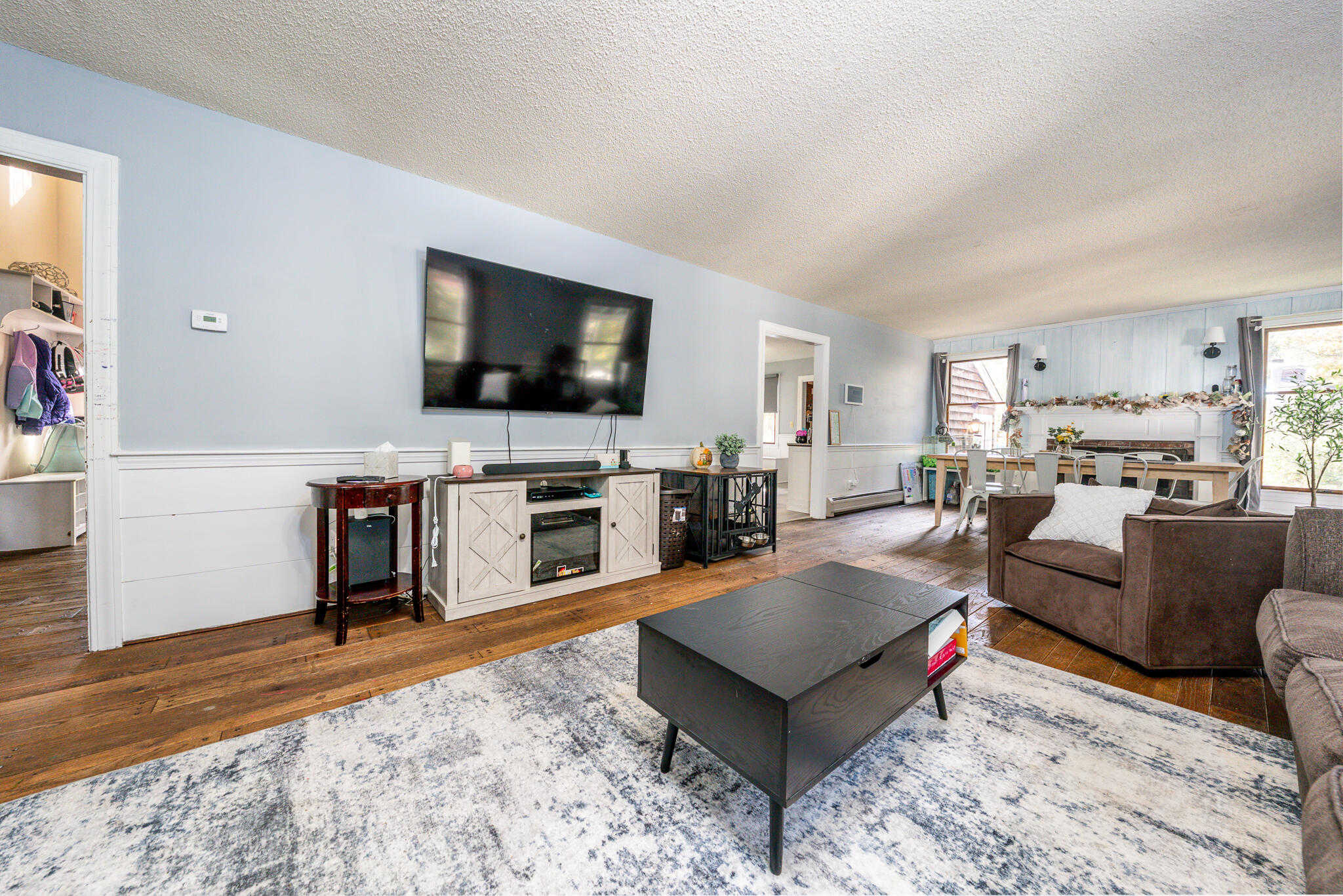 8 West Crossfield Road Forestdale, MA 02644 - Photo 20 of 45 a living room with furniture and a flat screen tv