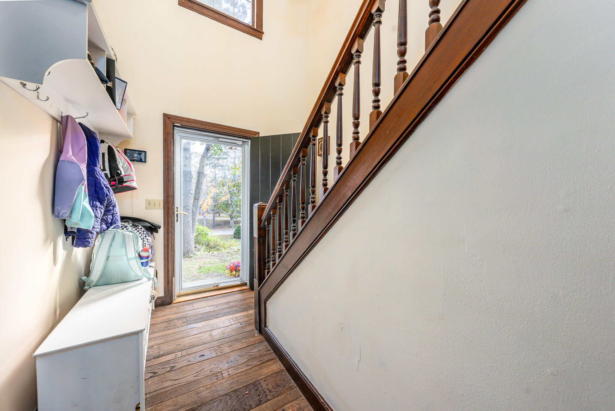 8 West Crossfield Road Forestdale, MA 02644 - Photo 24 of 45 a view of staircase with lots of frames on wall and wooden floor