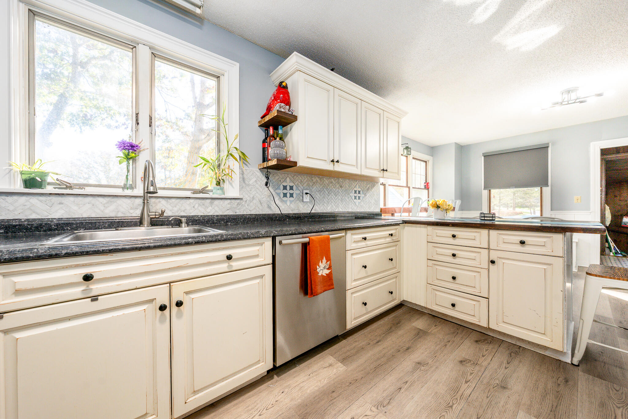 8 West Crossfield Road Forestdale, MA 02644 - Photo 9 of 45 a kitchen with granite countertop white cabinets white appliances and sink