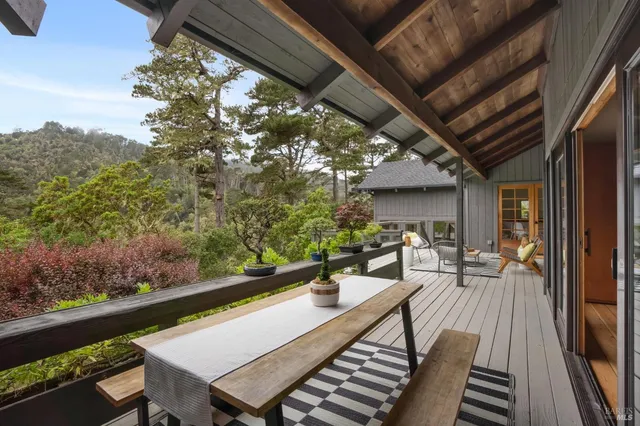 a bathroom with a toilet a sink and a mirror