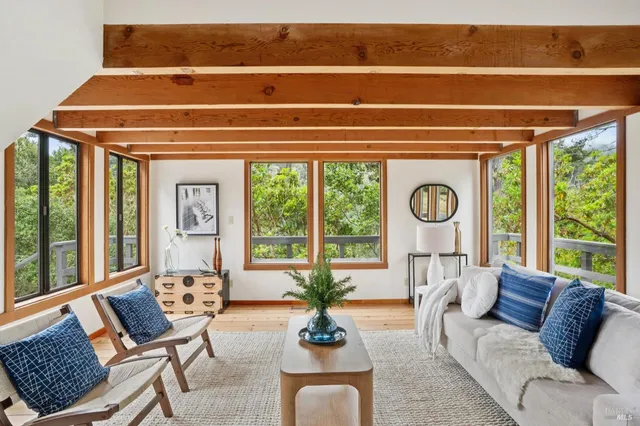 a view of a dining room and wooden floor