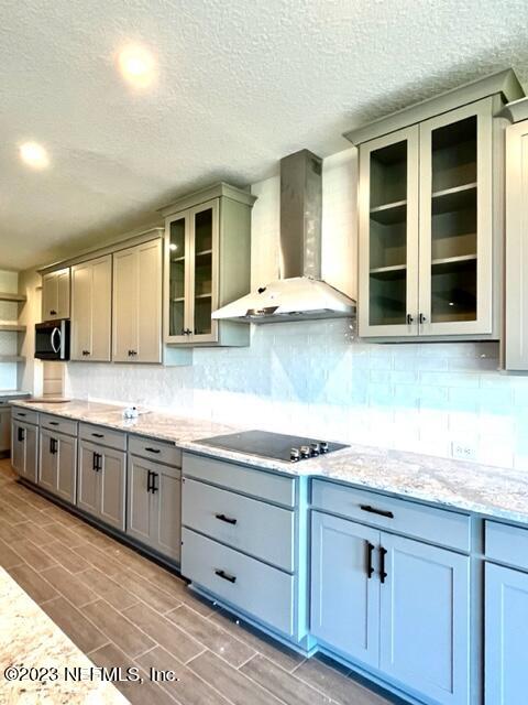 3880 Eagle Rock Road Middleburg, FL 32068 - Photo 5 of 7 a kitchen with granite countertop stainless steel appliances a sink and cabinets