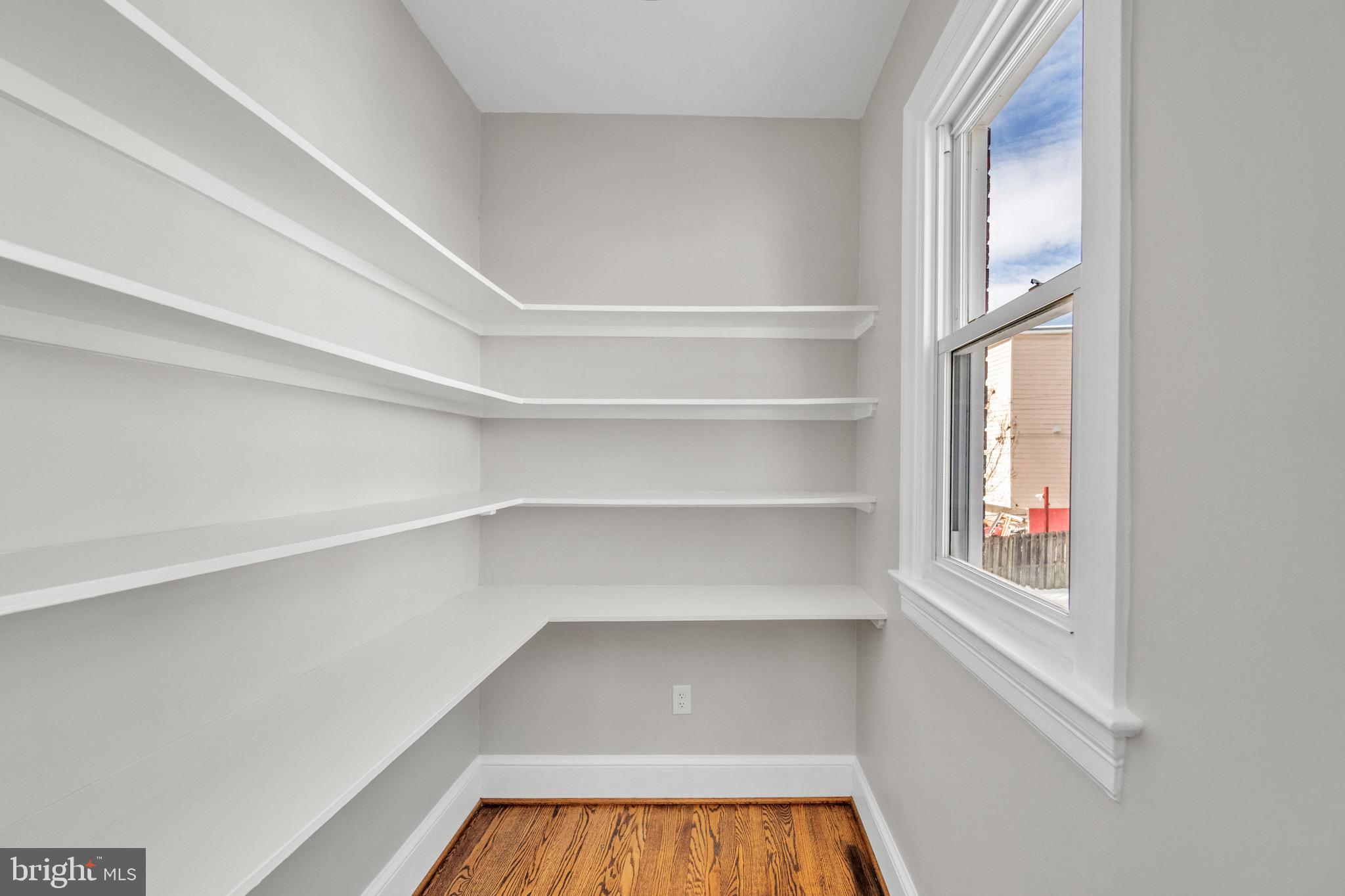 6018 2nd Street Northwest Washington, DC 20011 - Photo 8 of 18 a view of walk in closet with empty racks