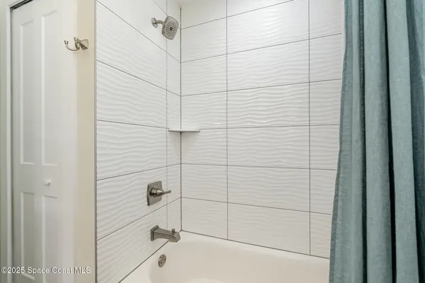 a bathroom with a bathtub