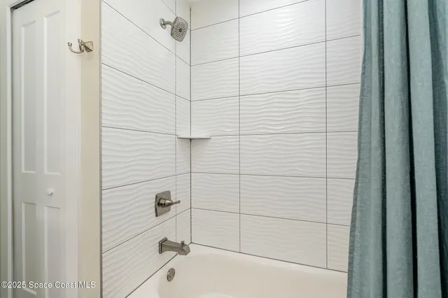 a bathroom with a bathtub