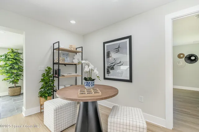 a view of a table and chairs in a room