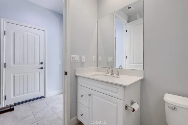 a bathroom with a bathtub a sink and a window