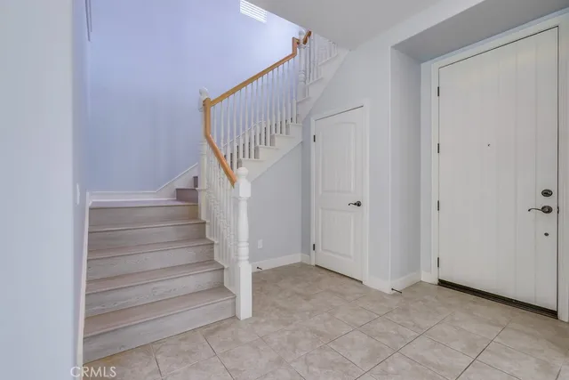 a bathroom with a bathtub and a window