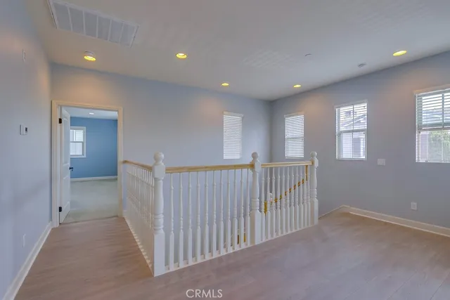 a bathroom with a double vanity sink toilet and shower