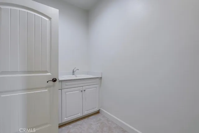 a swimming pool with outdoor seating and yard