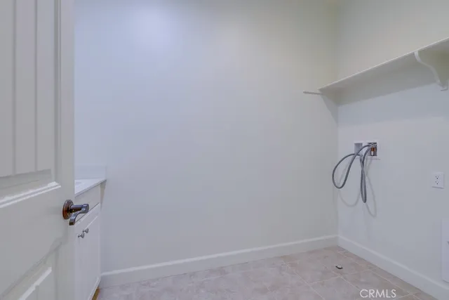 a view of swimming pool with outdoor seating and a patio