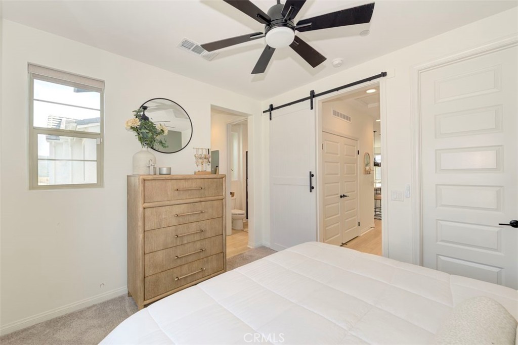 861 Cornelia Way Rancho Mission Viejo, CA 92694 - Photo 11 of 39 a bedroom with a bed and a closet