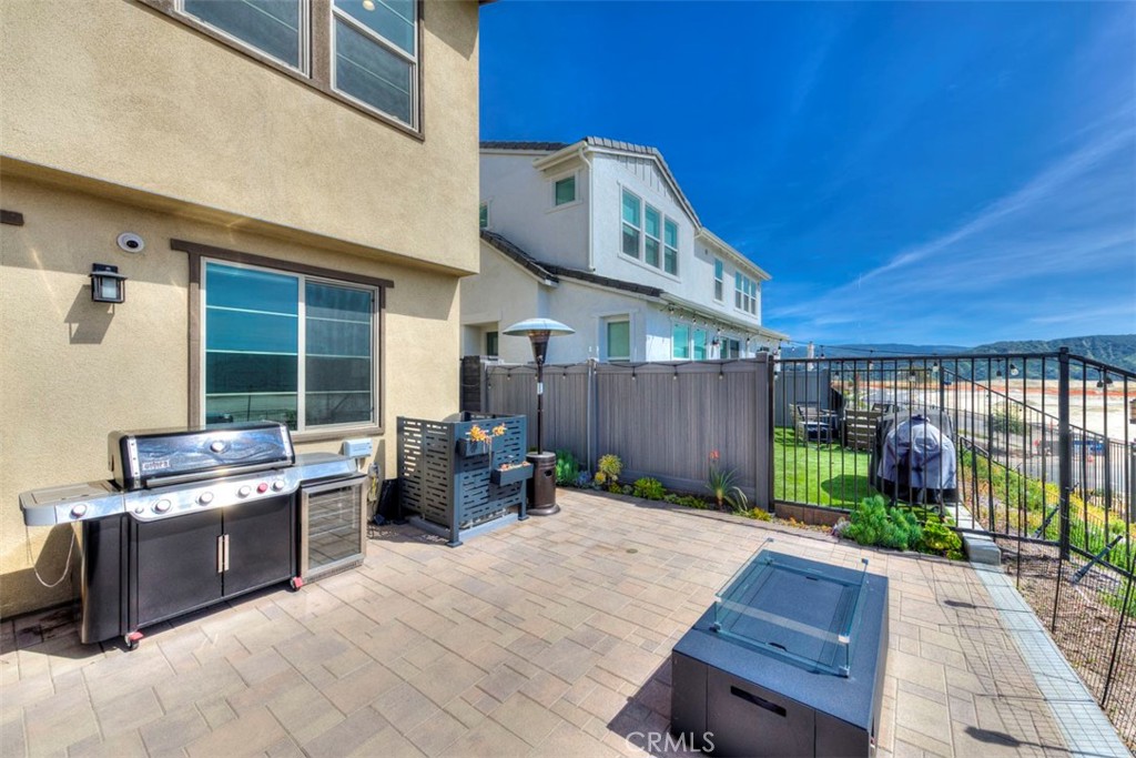 861 Cornelia Way Rancho Mission Viejo, CA 92694 - Photo 22 of 39 a backyard of a house with seating space