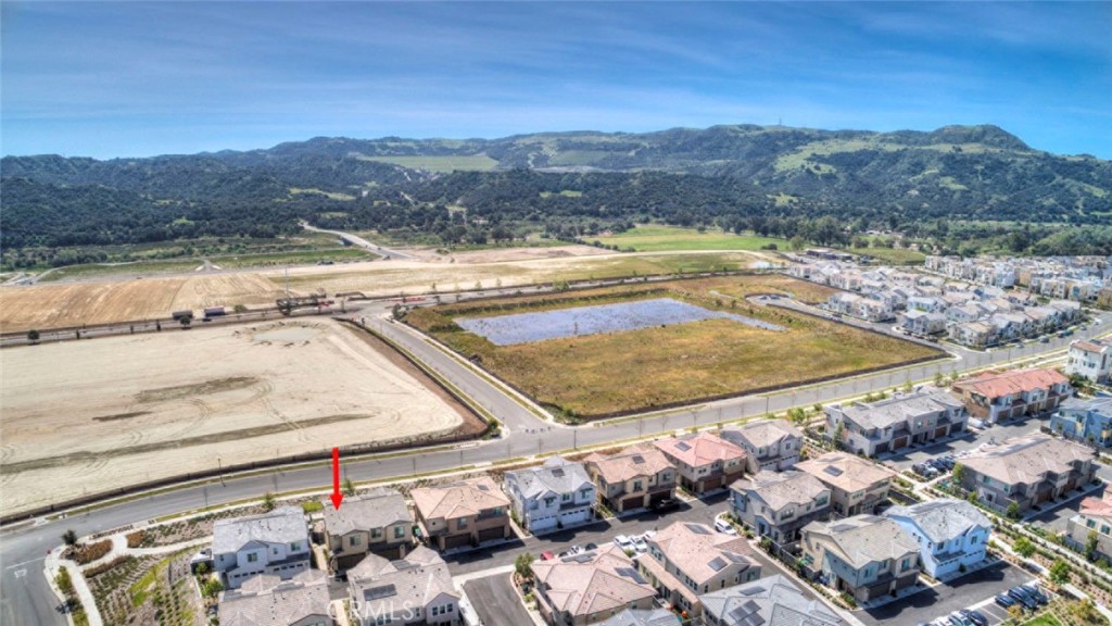 861 Cornelia Way Rancho Mission Viejo, CA 92694 - Photo 26 of 39 a view of a backyard with a ocean view