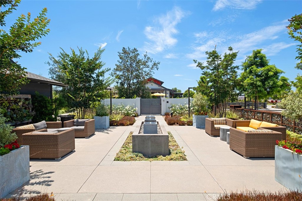 861 Cornelia Way Rancho Mission Viejo, CA 92694 - Photo 36 of 39 a view of a patio with couches and a fire pit