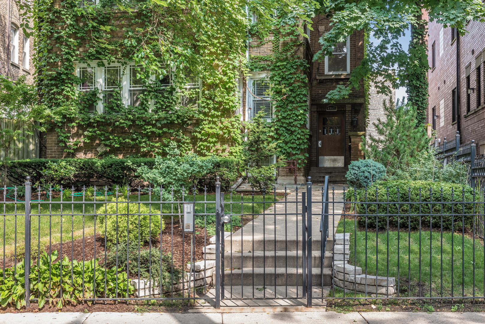 6967 North Sheridan Road, Unit 1 Chicago, IL 60626 - Photo 1 of 21 a view of a lake with a house