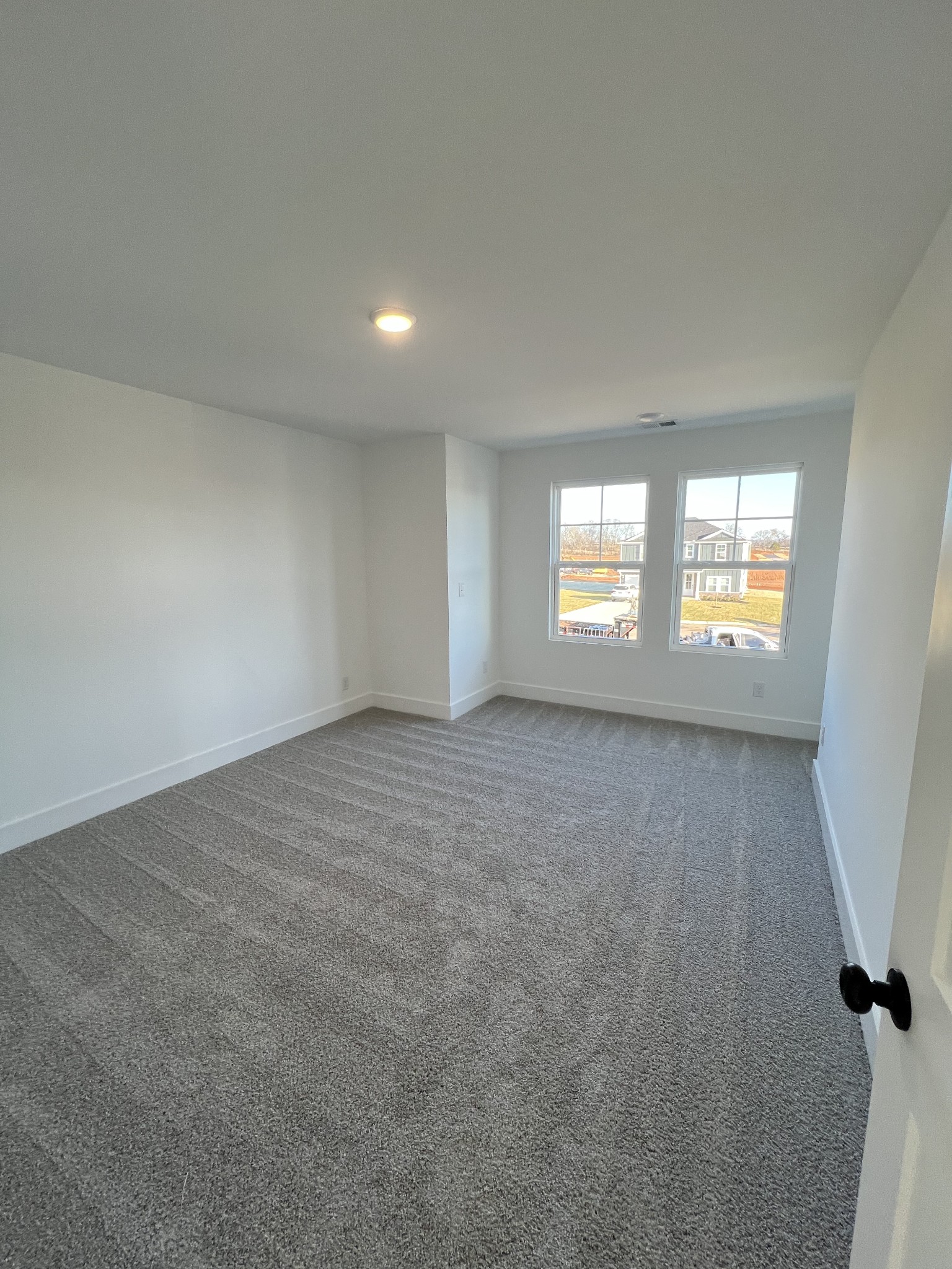 304 Strong Street Columbia, TN 38401 - Photo 17 of 49 an empty room with windows