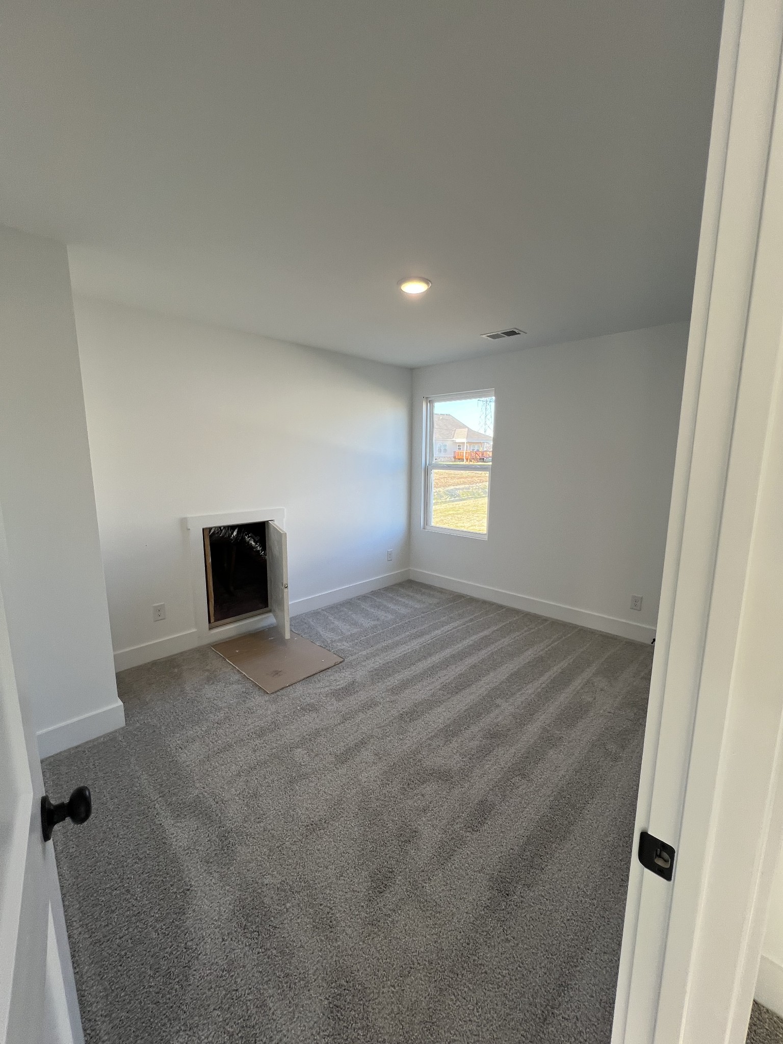 304 Strong Street Columbia, TN 38401 - Photo 19 of 49 a view of an empty room with a window