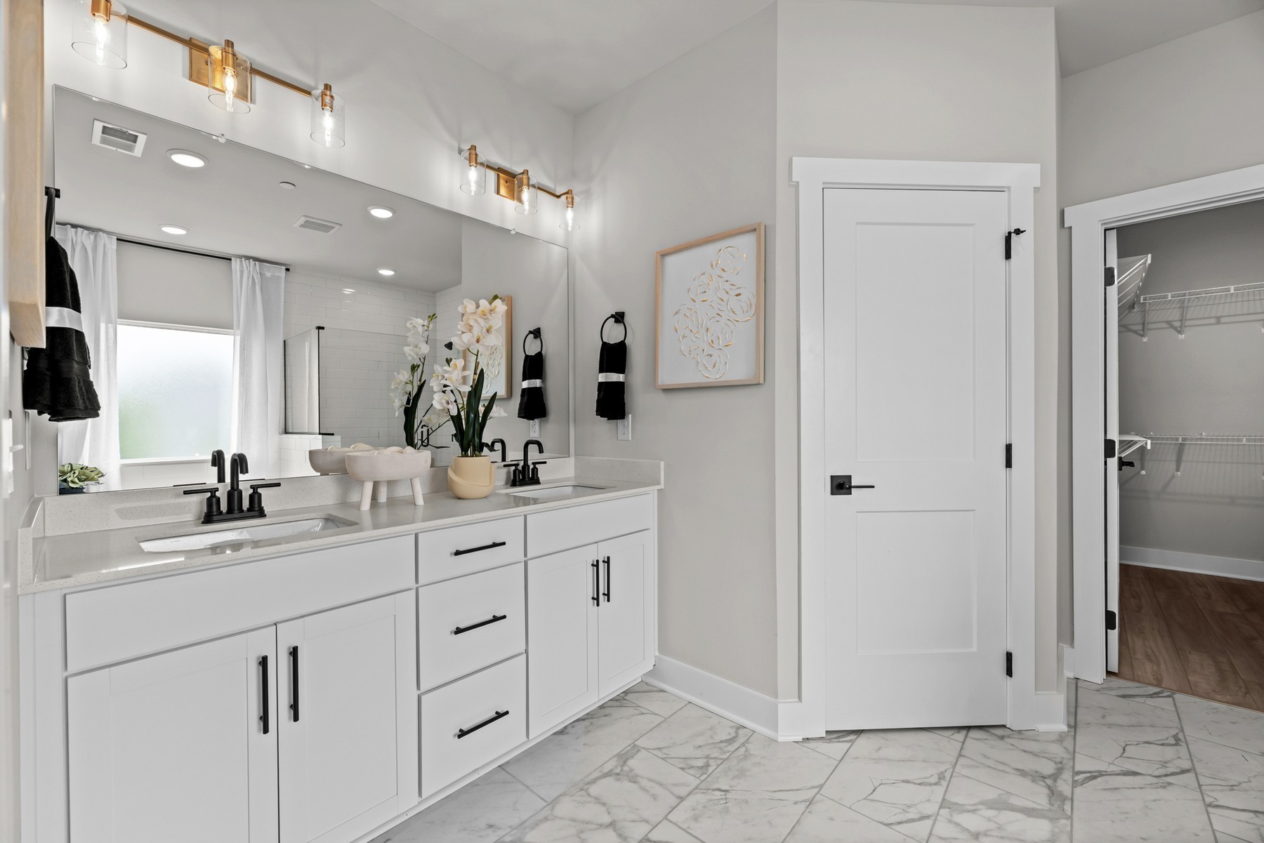 304 Strong Street Columbia, TN 38401 - Photo 31 of 49 a bathroom with a double vanity sink mirror and double