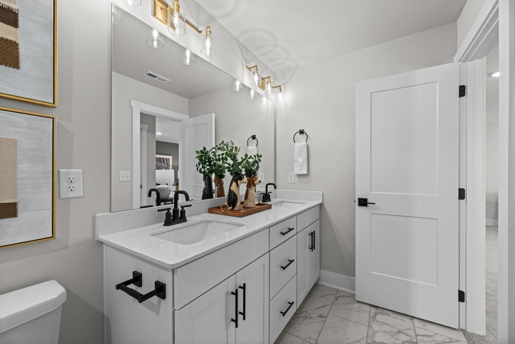 304 Strong Street Columbia, TN 38401 - Photo 47 of 49 a bathroom with a sink double vanity and a mirror