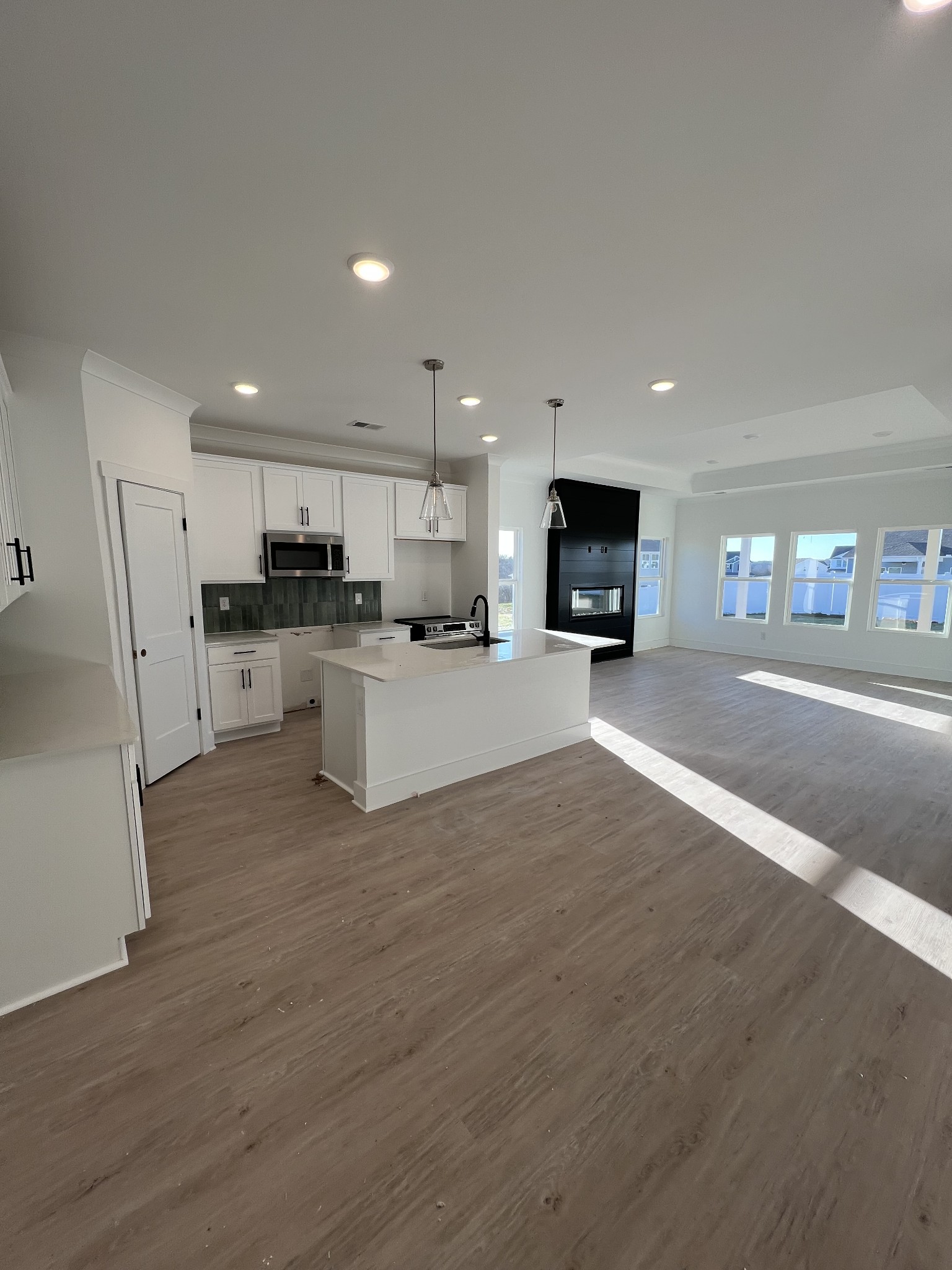 304 Strong Street Columbia, TN 38401 - Photo 5 of 49 a large kitchen with a large window and stainless steel appliances
