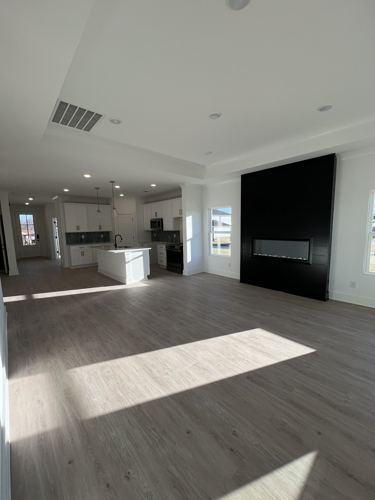 304 Strong Street Columbia, TN 38401 - Photo 6 of 49 a view of kitchen with cabinets and wooden floor