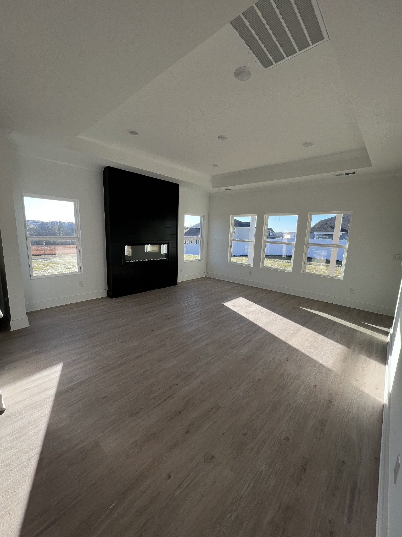 304 Strong Street Columbia, TN 38401 - Photo 7 of 49 a view of an empty room with a window and fireplace