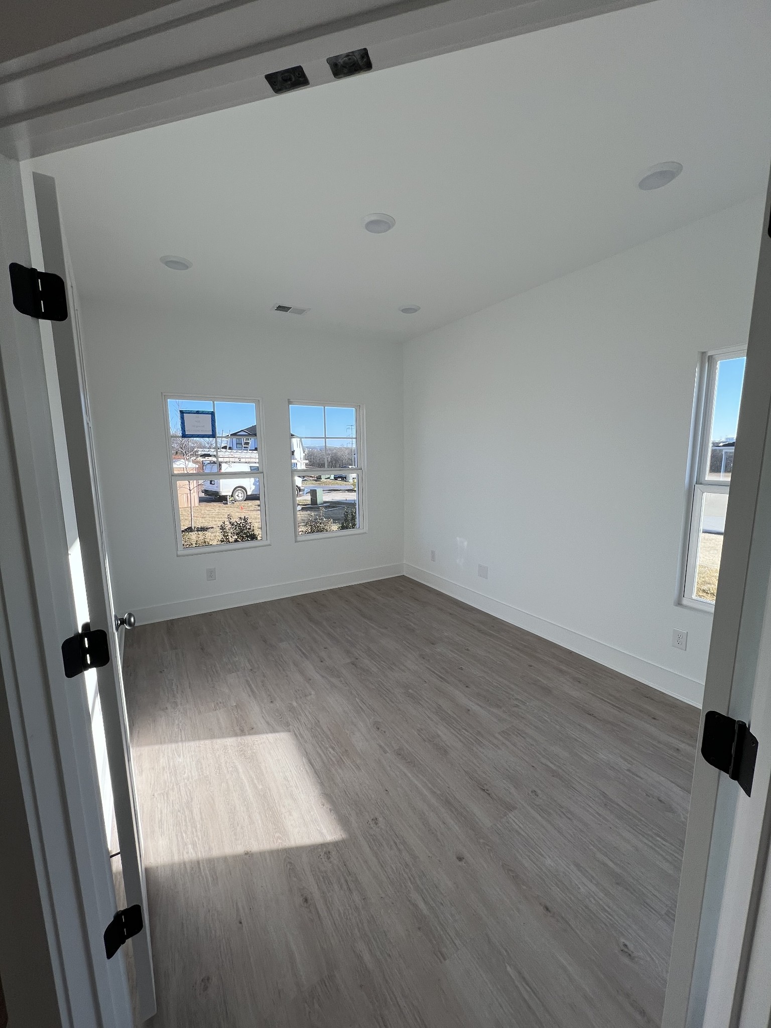 304 Strong Street Columbia, TN 38401 - Photo 9 of 49 an empty room with windows
