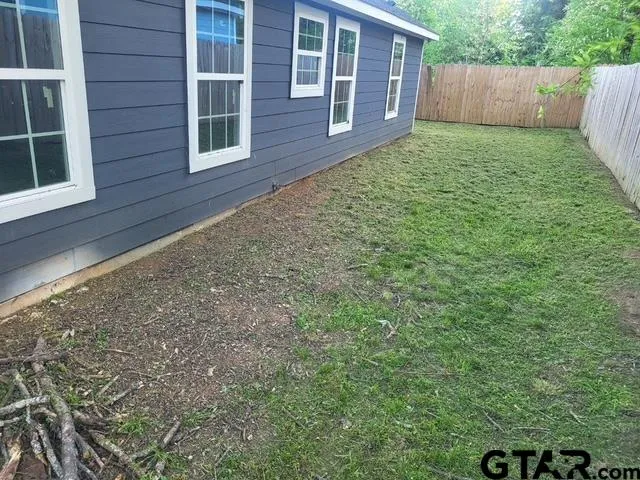 a view of a backyard with a garden