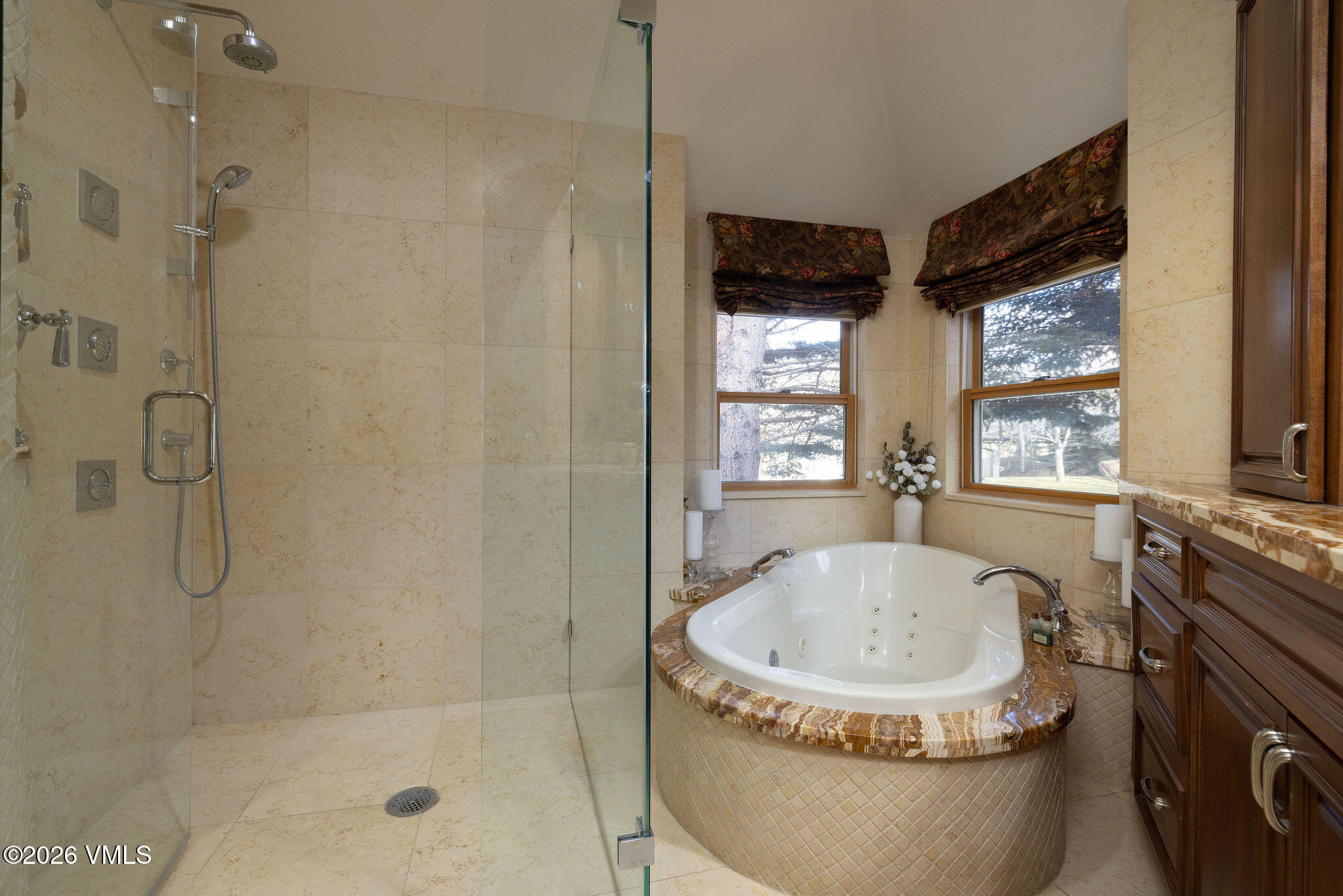 99 Castle Peak Close, Unit B Edwards, CO 81632 - Photo 13 of 35 a bathroom with a granite countertop sink a toilet and shower