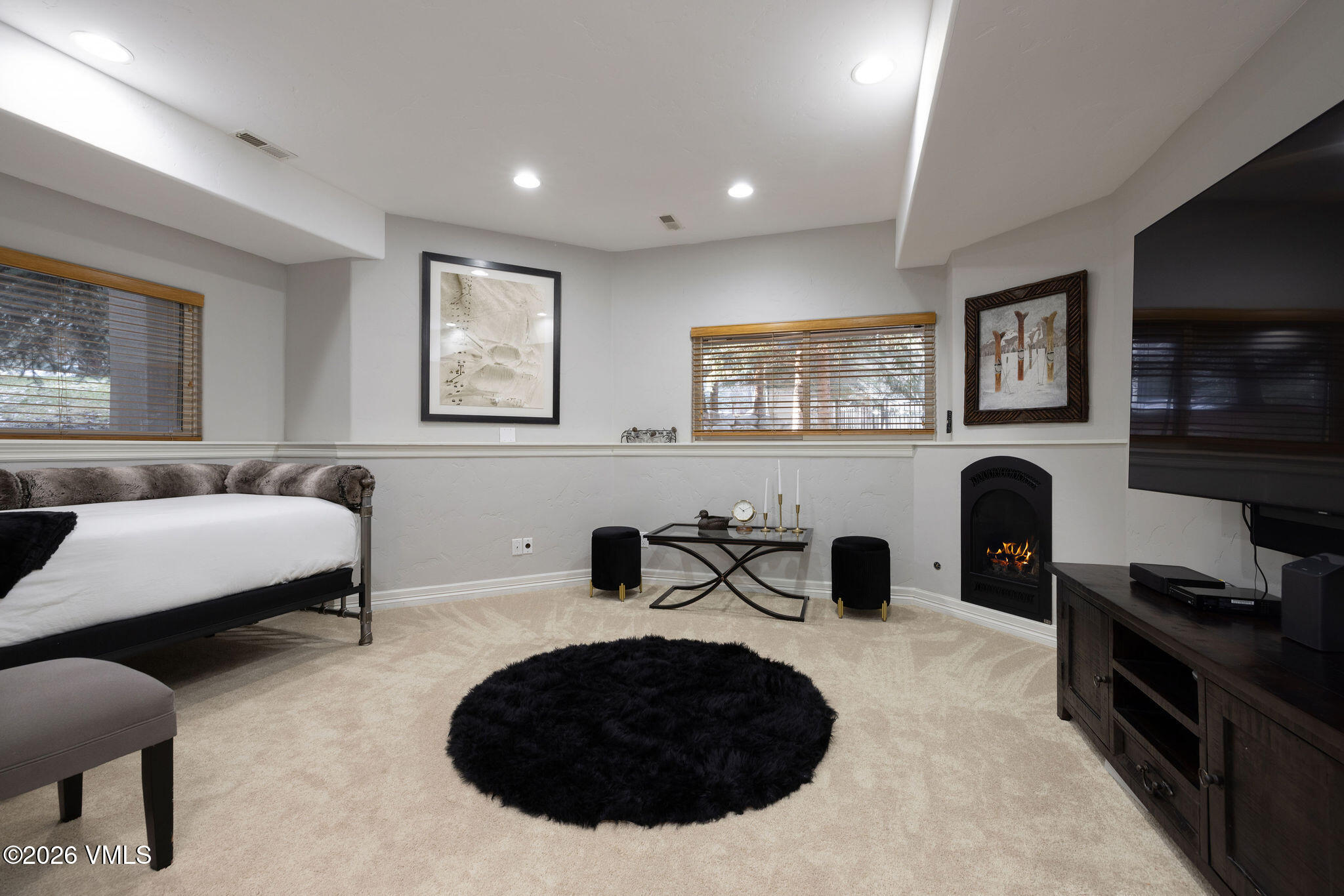 99 Castle Peak Close, Unit B Edwards, CO 81632 - Photo 18 of 35 a bedroom with a bed a couch and dresser