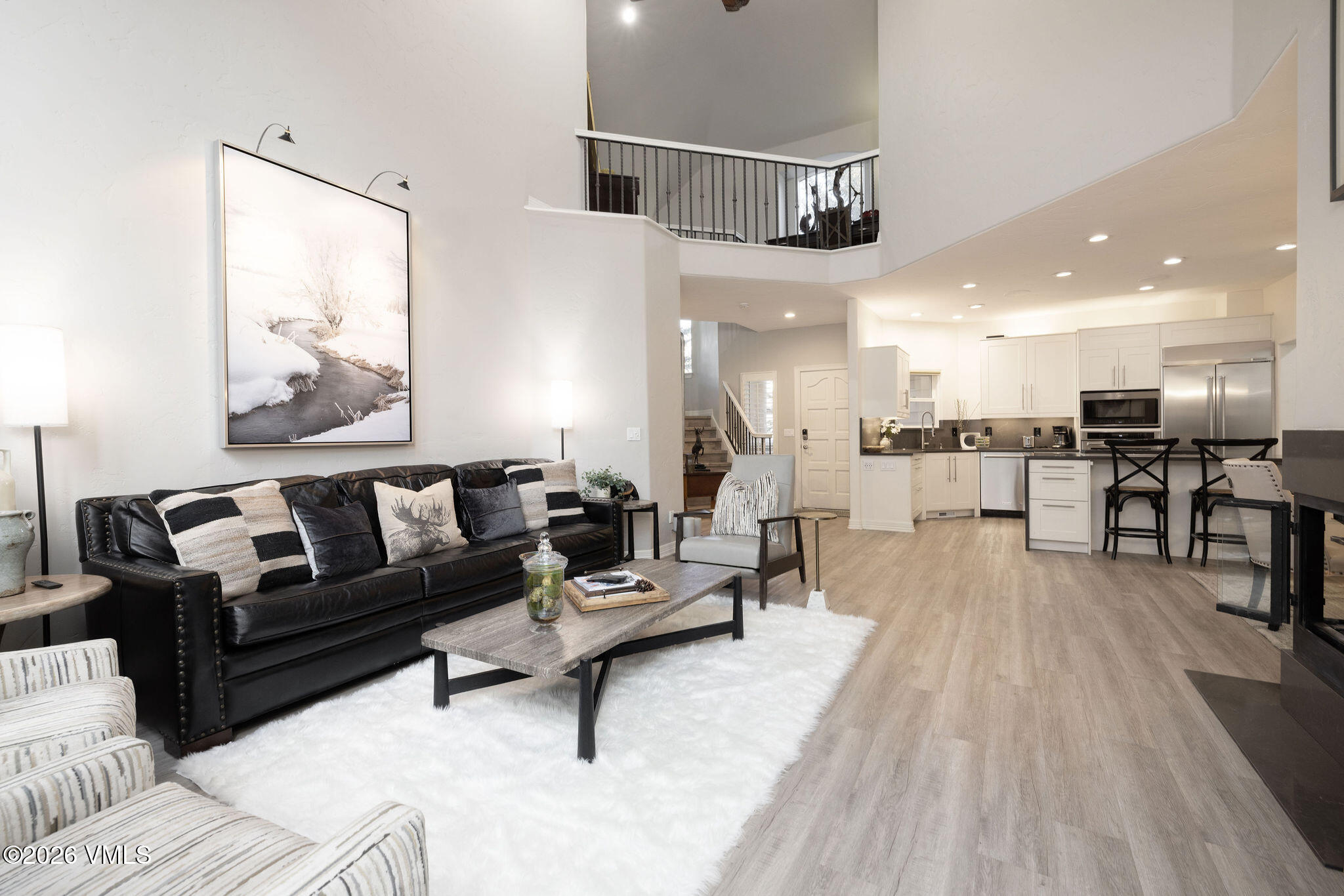 99 Castle Peak Close, Unit B Edwards, CO 81632 - Photo 3 of 35 a living room with furniture and a table