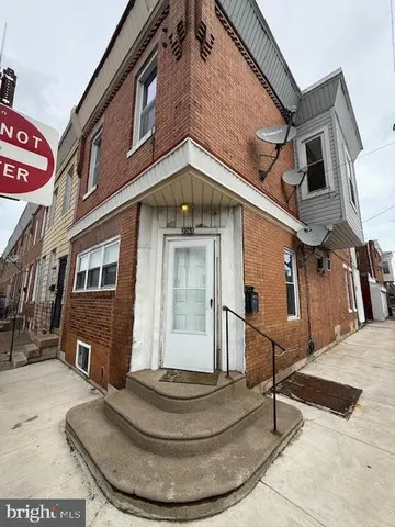 a front view of a house with entertaining space