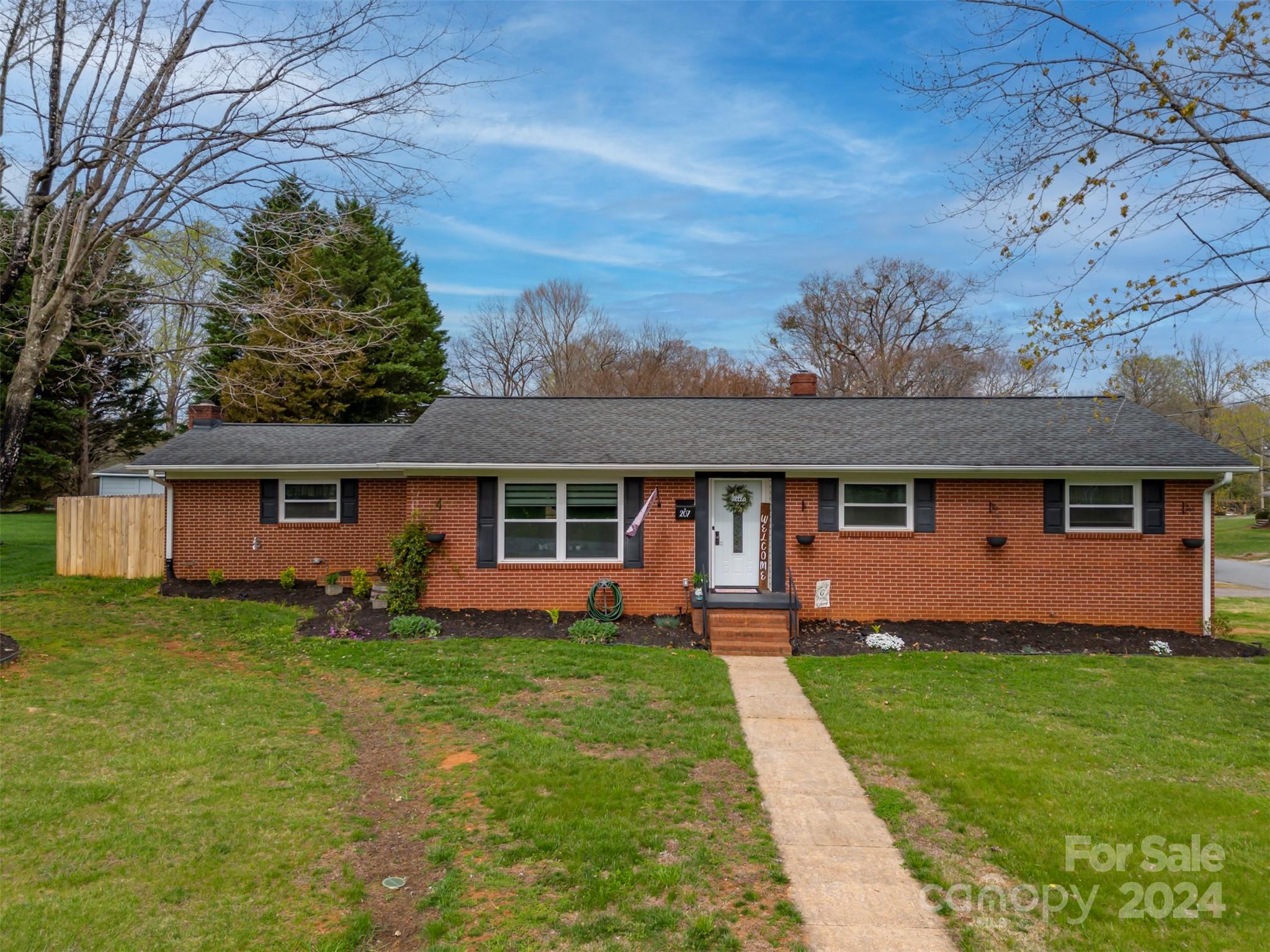 207 Smith Grove Road Forest City, NC 28043 - Photo 1 of 37 front view of a house with a yard