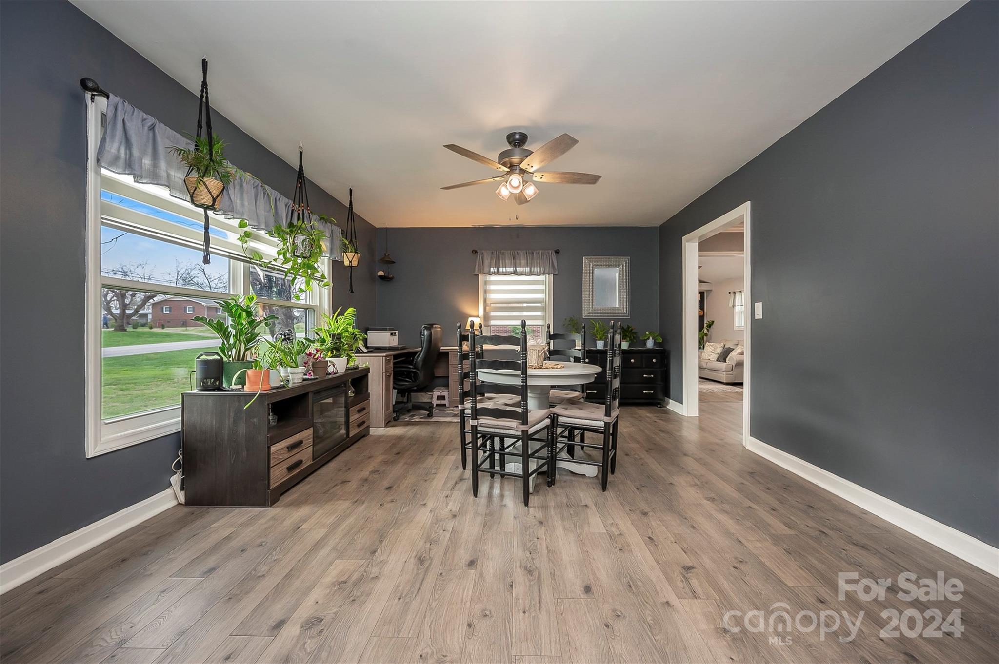 207 Smith Grove Road Forest City, NC 28043 - Photo 11 of 37 a living room with furniture and a large window