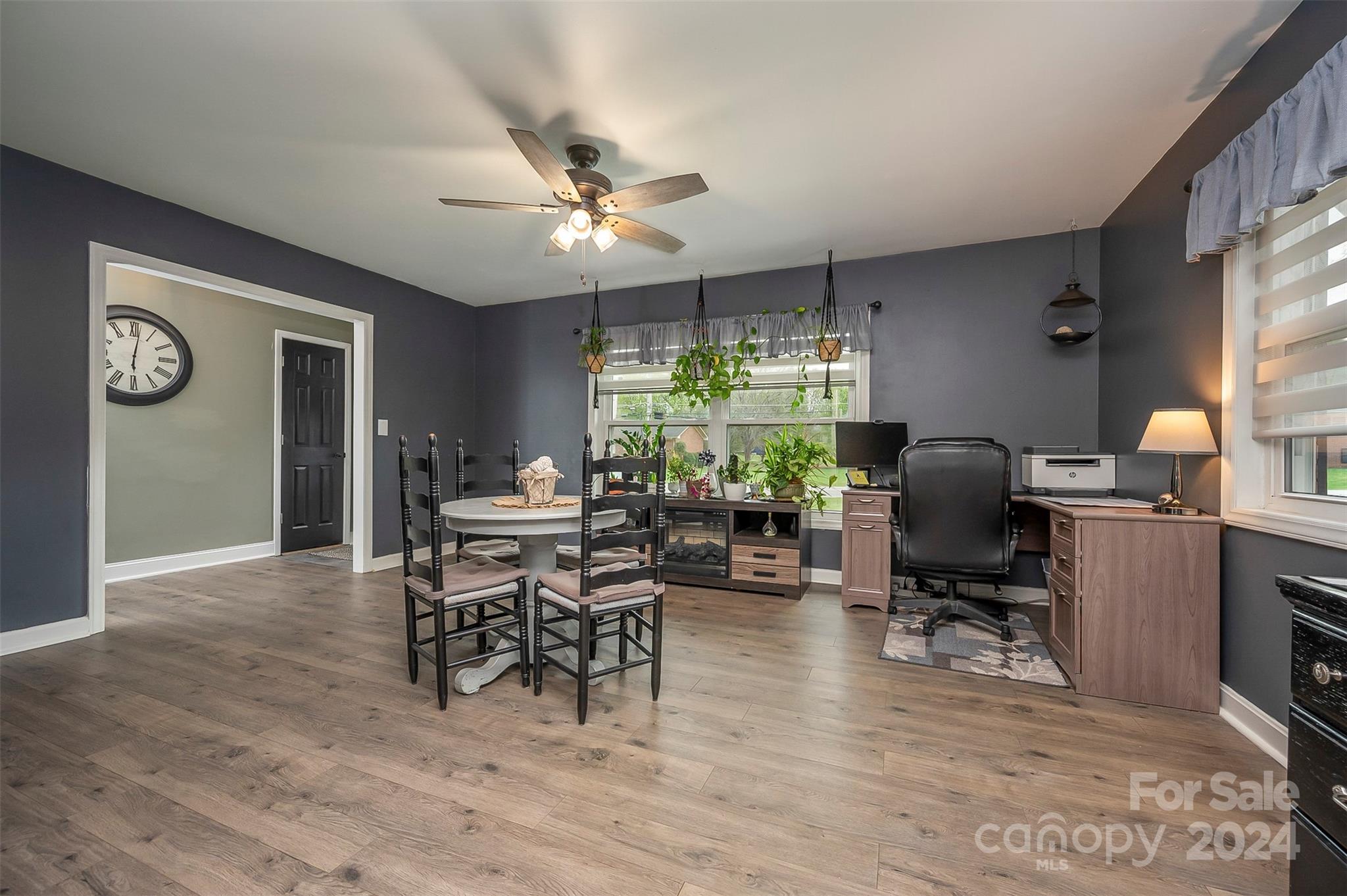 207 Smith Grove Road Forest City, NC 28043 - Photo 12 of 37 a workspace with furniture window and wooden floor